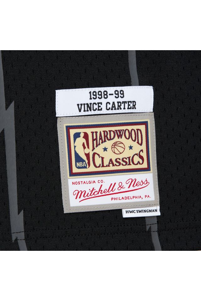 Regata-Mitchell---Ness-Glow-In-The-Dark-Swingman-Jersey-Toronto-Raptors-1998-99-Vince-Carter-Preta Regata-Mitchell---Ness-Glow-In-The-Dark-Swingman-Jersey-Toronto-Raptors-1998-99-Vince-Carter-Preta